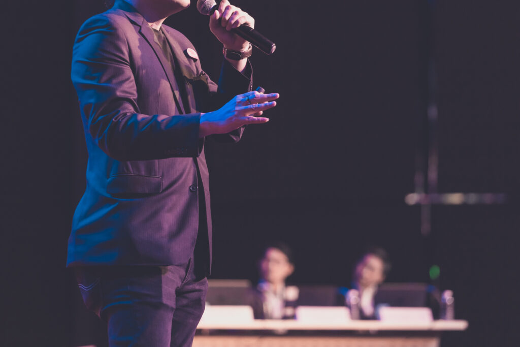 Technical director at a switcher during a live General Session